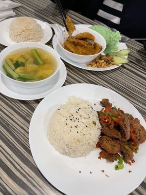 Chicken rice, wonton soup, nasi lemak with pandan rice, salt and pepper tofu  at Vege Munch in Northbridge