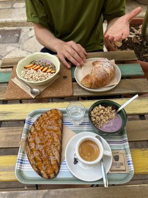 Breakfast combo ($4, on the bottom) and yogurt bowl and croissant (on top)  at Terza Luna in Trani