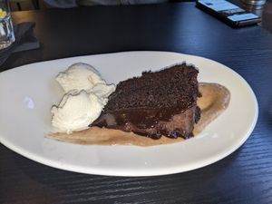 Espresso and chocolate cake with hot rum sauce and vegan ice cream at Jungle Bird in Birmingham