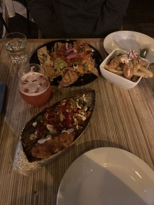 Shrimp loaded fries , nachos and fritters   at Jungle Bird in Birmingham