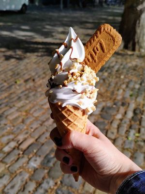 Ice cream cone with chocolate sauce and mixed nuts. at The Happy Cow in Bristol