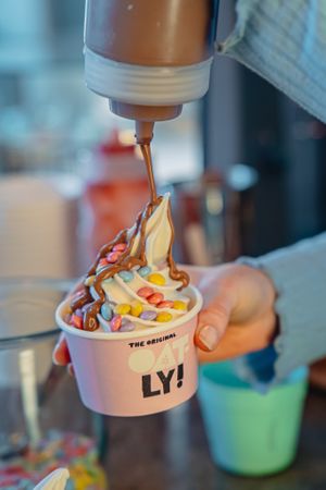 Vegan oatly softserve with homemade sauces and delicious toppings at Kjeks - Ottensen in Hamburg