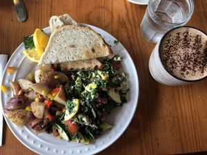 Tofu scramble with hash browns & sourdough toast, and an almond-milk mocha.Yum! at Savoy Cafe and Deli in Santa Barbara