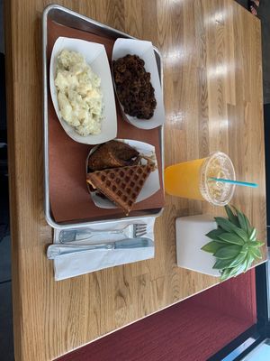 Impossible Cut with waffle, baked beans and potato salad.  Mandarin cardamom drink!    at Pure Grit BBQ in New York City