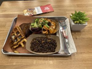 BBQ meat loaf beans veggies and waffle at Pure Grit BBQ in New York City