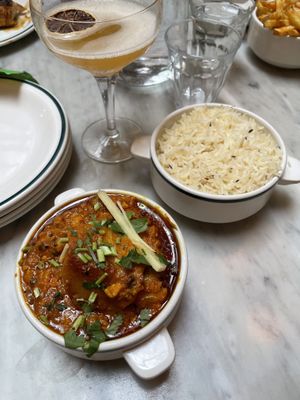 Aloo gobi curry (with cauliflower and potatoes) with rice (and a half drank earl grey cocktail)   at Chaakoo - City Centre in Glasgow