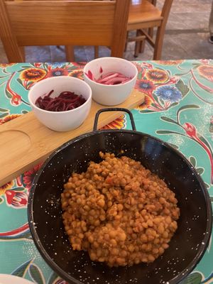 Cazuelitas with lentils and garnishes  at Taquería Las Calacas in Gijon