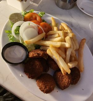 zucchini balls with fries, salad and a garlic dip at Tea for Two in Paphos