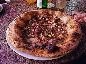Mushrooms pizza: just perfect. at Al Catzone Pizza Napovegana in Berlin