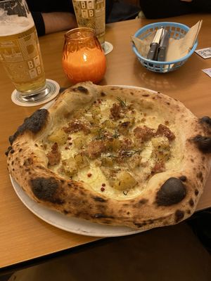 Potatoes on pizza🩷  at Al Catzone Pizza Napovegana in Berlin