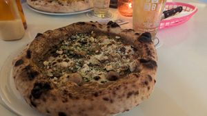 Mushroom pizza at Al Catzone Pizza Napovegana in Berlin
