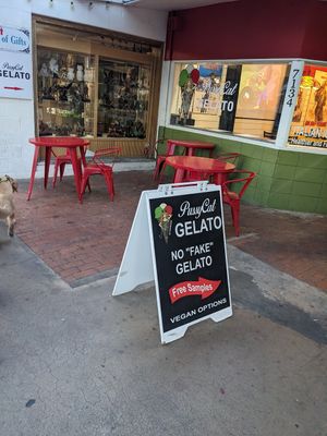 Sign on curb at PussyCat Gelato in Scottsdale