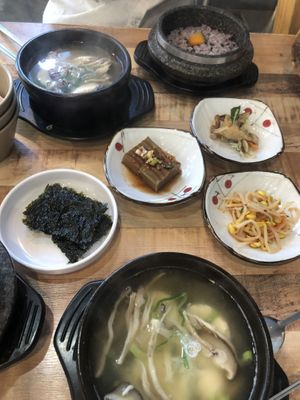 Tofu and Mushroom Jigae with side dishes. Reccomend not to consume side dishes (excepted seaweed) as it is unconfirmed if there are animal products inside   at Ilpum Soft Tofu  in Jeju