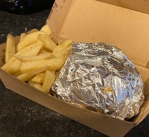 Vegan burger and chips  at Frango Charcoal Chicken in Swansea