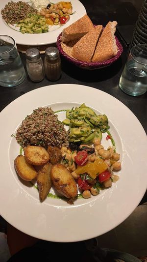 Vegetarian plate made vegan by adding potatoes and removing yoghurt   at Nomad in Marrakech