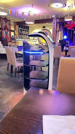 This cutie robot served my entree. at 615Chutney in Nashville