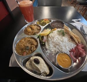 Nepalese thali and beet juice  at Veggie Garden - Dels Angels in Barcelona