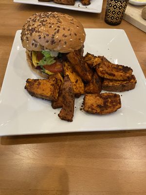 Another take of the burger and sweet potato wedges. Comes with a smoky handcrafted cheese.   at Full Taste in Chamblee