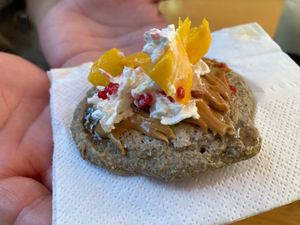 Oat pancake with whipped cream, mangos, berries and peanut butter at La Selva de los Gatos in Oaxaca