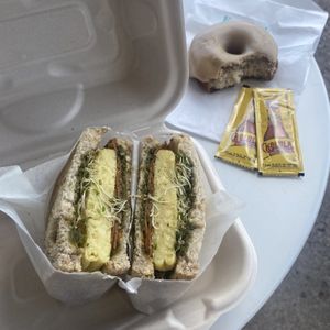 Vegan Breakfast Sandwich and a Maple Bacon Pecan vegan donut 🍩  at East Park Donuts and Coffee in Nashville