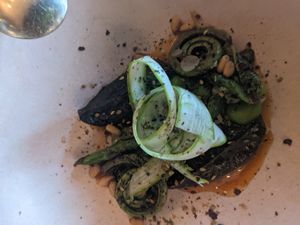 Babaganoush with vegetables like fiddlehead fern at Albi in Washington