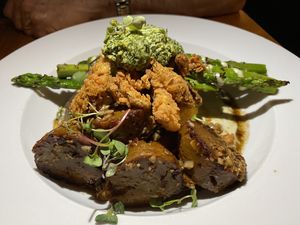 Sausage, polenta, cashew sauce dish.   at Ipanema in Richmond