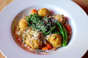 Pumpkin dumplings with broccoli rabe and white bean stew. at Ipanema in Richmond