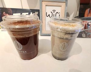 Black Sesame Nut Mylk (on the right) and the Earl Grey with Chocolate Nut Cream (on the left) at NUTTEA in Edmonton