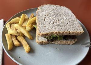 Burger bun was replaced with sourdough bread. You could probably ask them to toast it.  at Land Food and Coffee in Funchal
