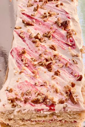 Summer Cake
Pineapple cake, raspberry jam, lemon-vanilla frosting and topped with pecans. ( cake flavors change weekly) at Indigo Valley in Wasilla