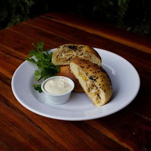 Potato bread with vegan chicken and corn filling at Nabati Comida Vegana in Natal