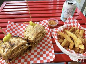 Vegan sandwich and fries  at Little Brother in Outlying Islands