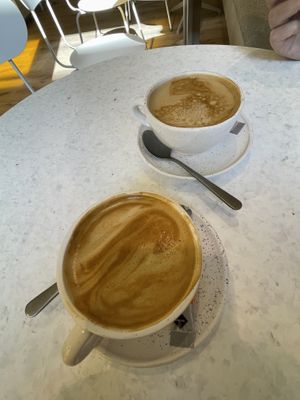 Two flat whites   at Oats Day Long in Brussels