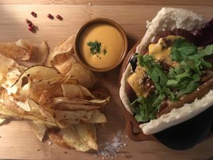 Homemade falafel in pita bread, chips and tandoori sauce.  at Hesperides in Lanzarote