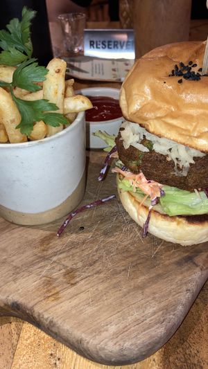 Falafel burger with fries and extra vegan cheese  at Simply Social in Ubud