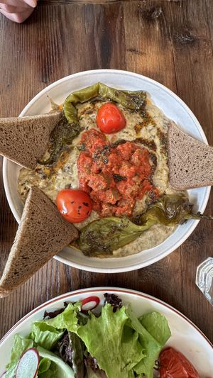 Smoked eggplant 🍆 with vegan meatballs and tomato sauce and peppers 🌶️   at Vegan Dükkan Lokanta - The Eatery in Istanbul