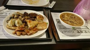 A plate of various vege foods and a bowl of delicious noodles!  at Minder Vegetarian 明德素食 - Q Square Mall in Taipei