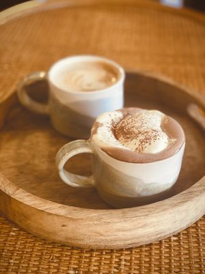 Plant-based latte and hot chocolate m  at The Tinker's Granddaughter in Lymington