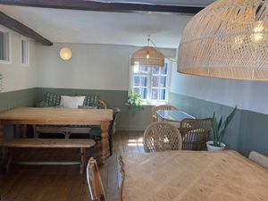 More seating upstairs, where dogs are welcome and large tables lend themselves to groups, workspaces and family dining! at The Tinker's Granddaughter in Lymington