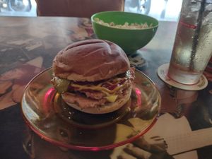 Soggy. Too much ketchup and mustard.  The free popcorn was stale at Garage Sale in Phnom Penh