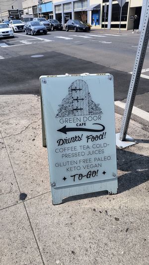 Street sign at Green Door Cafe in Astoria