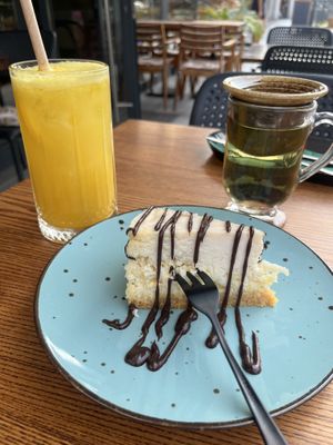Pineapple Cheesecake, Fresh Orange Juice, Mint Teaa  at Pink in Warsaw