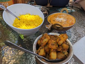 Bombay aloo (front), and Nirvana Curry at Apna Indian Kitchen in Santa Barbara