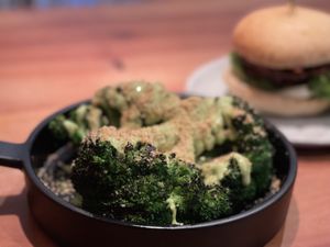 Grilled broccoli with dairy-free dressing  at Arbor in San Francisco