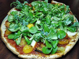 Gluten-free Pizzetta with Sundried Tomato Sauce, Roasted Heirloom Tomatoes, Cashew Milk Mozzarella with Chilli Oil & Seasoned Organic Rocket  S$28 at Cultivate Cafe in Central Singapore