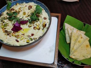 Classic Hummus with Za'atar & Orange oil  
S$16 at Cultivate Cafe in Central Singapore