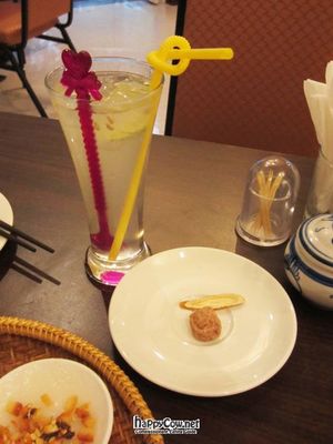 Lemon juice (lemonade) with licorice and salted apricot (the waitress put them on the side because she didn't think foreigners would like them. at Tinh Quan in Hue