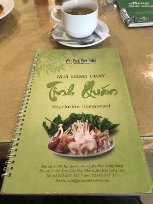 Menu and ginger tea at Tinh Quan in Hue