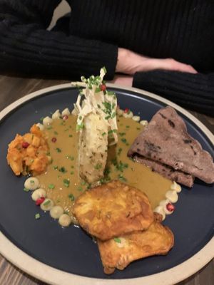 A celebration of celeriac (steak, pakoras, achaar, remoulade, chutney) with pearl millet bread - delicious   at Késarum in Southampton