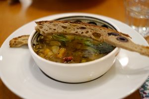 Soupe du jour : légumes moulinés, épicé façon couscous, toast géant aux olives noires at Mariposas in Marseille